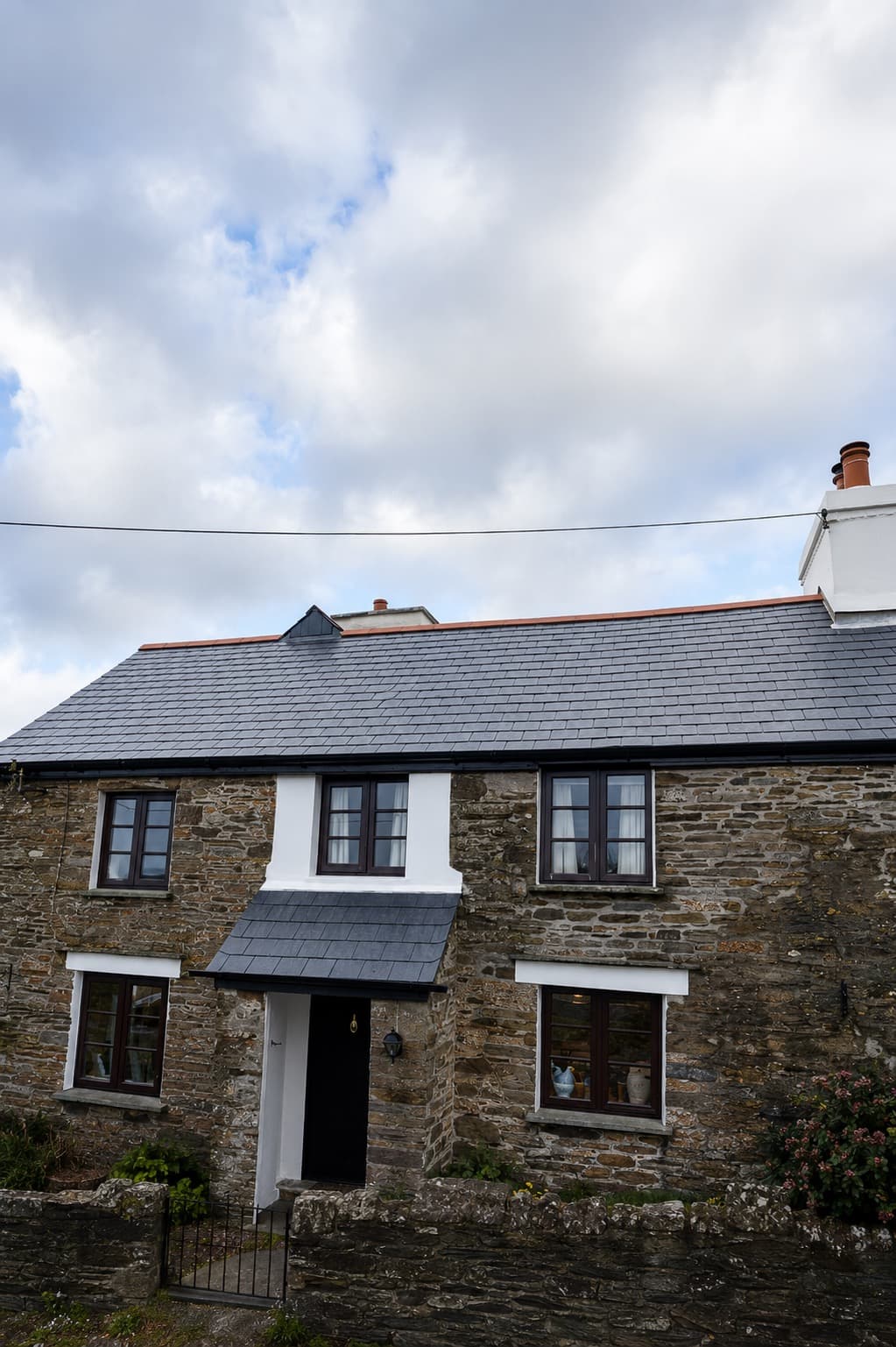 Aerial view of a residential re-roof in progress in Bodmin & Cornwall
